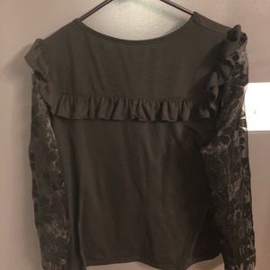 Black long sleeve blouse with sheer sleeves